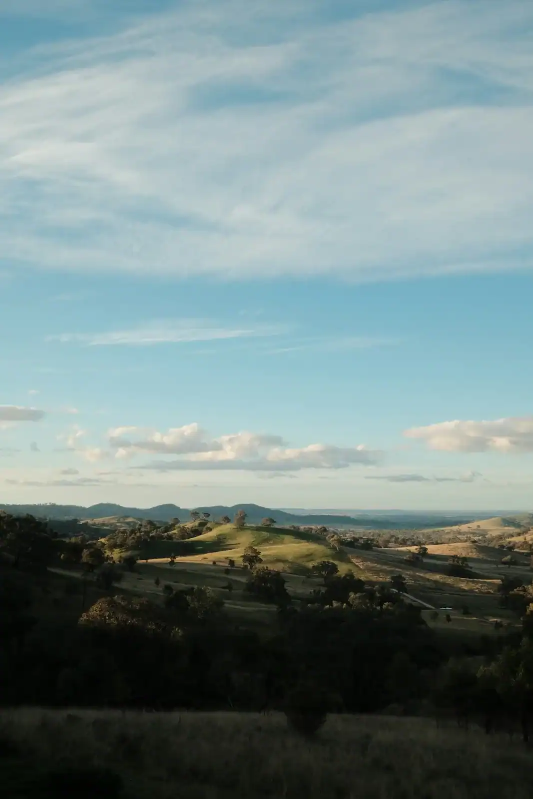 Rolling country hills beneath a wide open sky